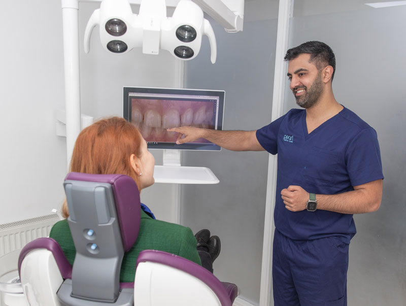 Dentist explaining treatment
