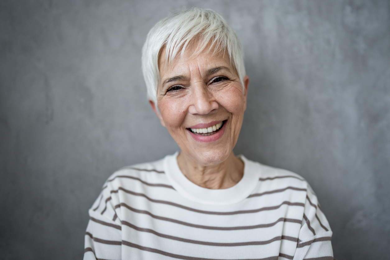 Confident smile after dental implants Kingston treatment